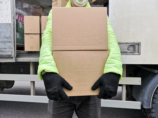 shipment of seafood being carried by a delivery man
